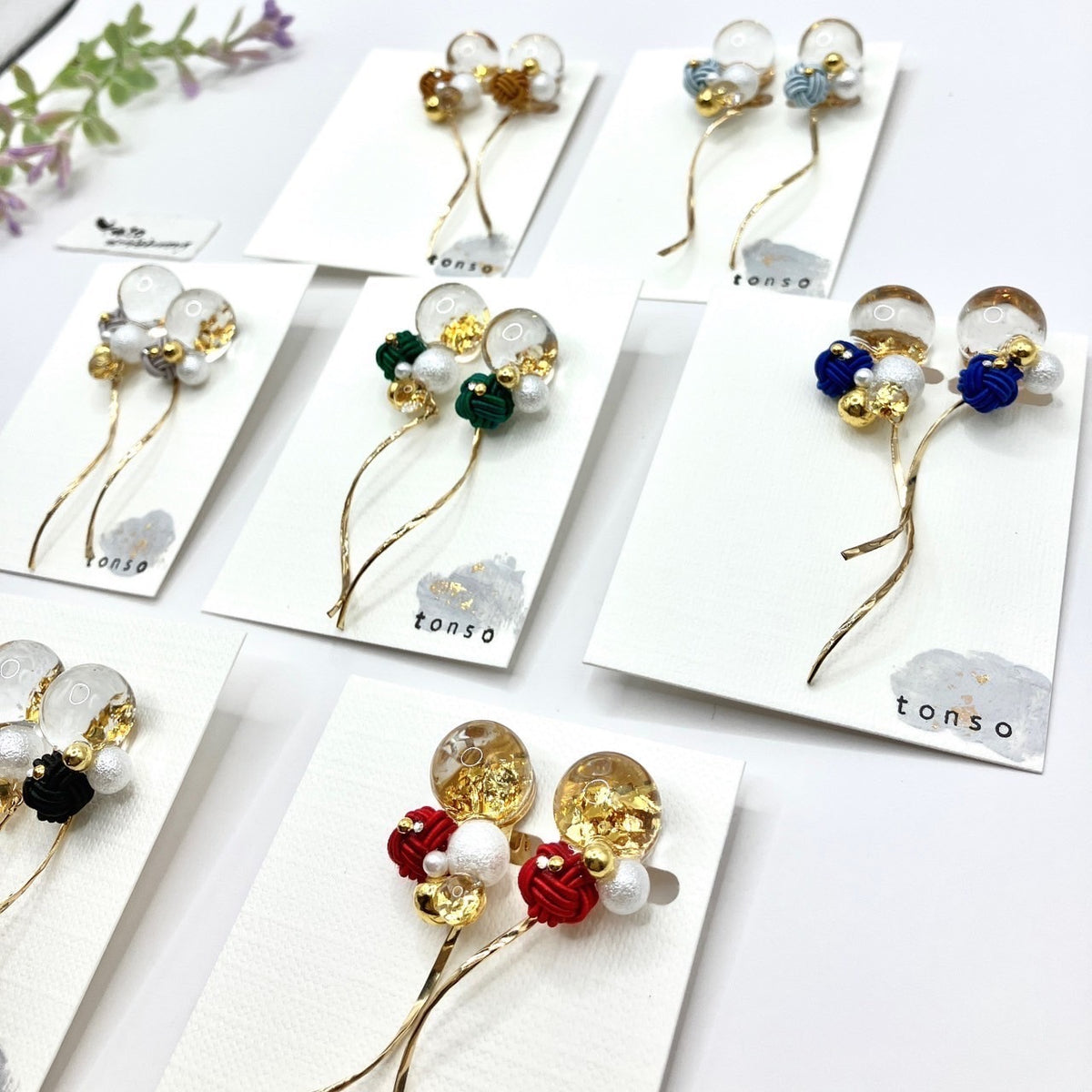 Yuragi earrings featuring colorful mizuhiki cords